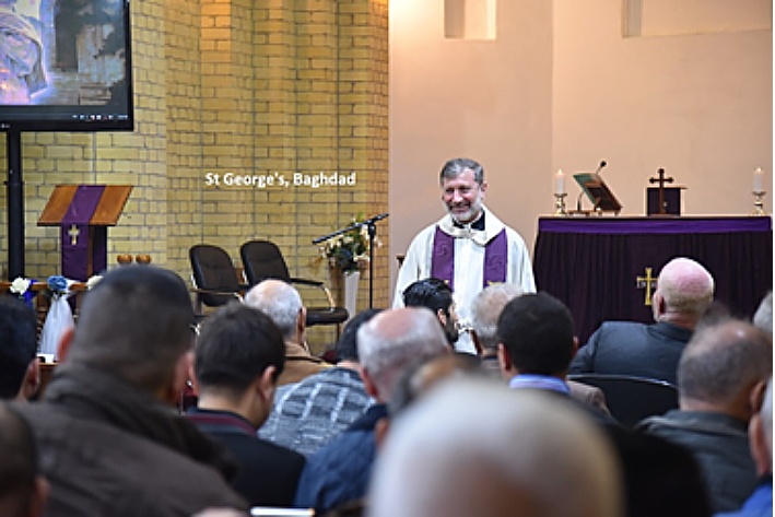 Preaching to his congregation