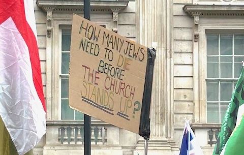 A Christian's placard criticised the Church's silence over anti-Jewish hatred